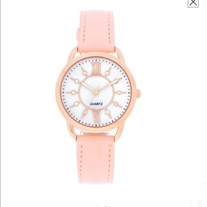 Woman’s beautiful leather watch with cubic zirconi